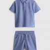 1,5–8 år | Sæt bestående af poloshirt og shorts