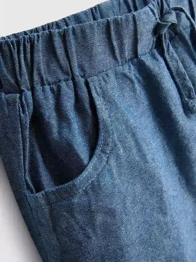 0–12 måneder | Sæt med stribet strikket poloshirt og shorts