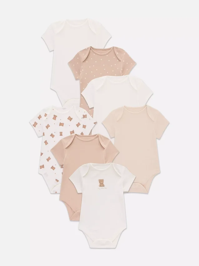 0–36 måneder | 7-pak kortærmede bodysuits