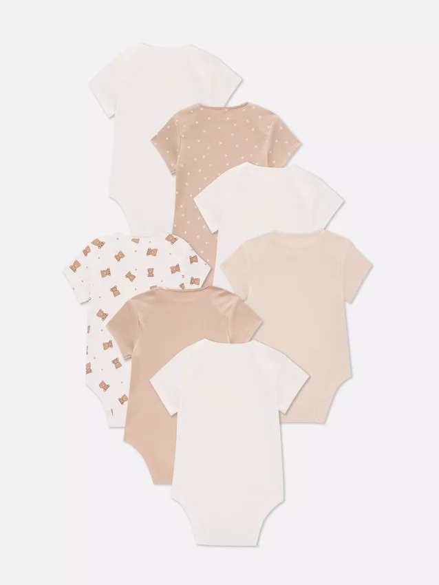 0–36 måneder | 7-pak kortærmede bodysuits