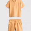 1,5–8 år | Sæt bestående af poloshirt og shorts