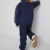 1,5–8 år | Sæt med sweatshirt med tragtkrave og joggingbukser