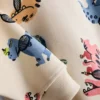 1,5–8 år | Sæt med sweatshirt og sweatbukser med dinosaur-motiv