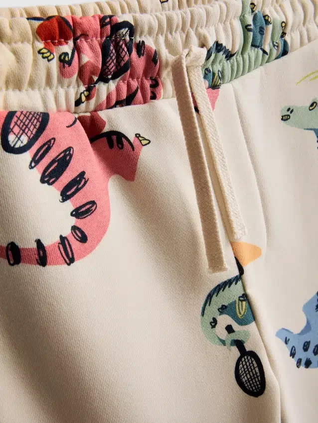 1,5–8 år | Sæt med sweatshirt og sweatbukser med dinosaur-motiv