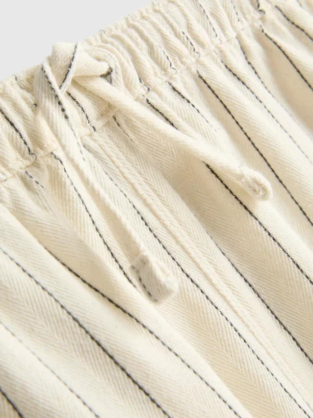 1,5–9 år | Jeans med brede ben og nålestriber