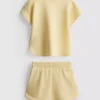1,5–9 år | sæt bestående af T-shirt og løbeshorts