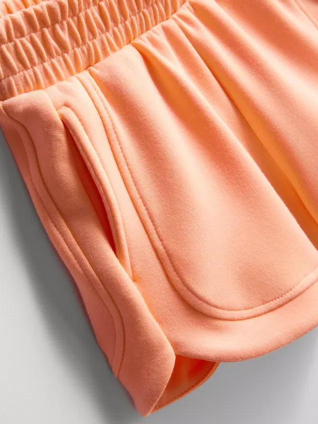 1,5–9 år | sæt bestående af T-shirt og løbeshorts