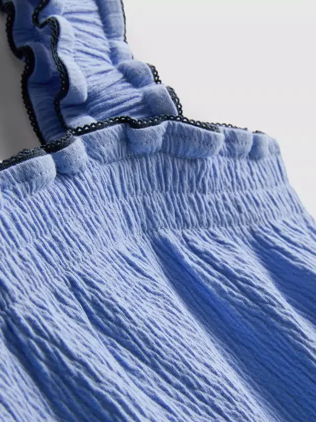 1,5–9 år | Sæt med bluse og shorts i krøllet tekstur