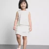 1,5–9 år | skort med blonder og lag på lag