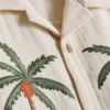 1,5–9 år | T-shirt med broderet palme