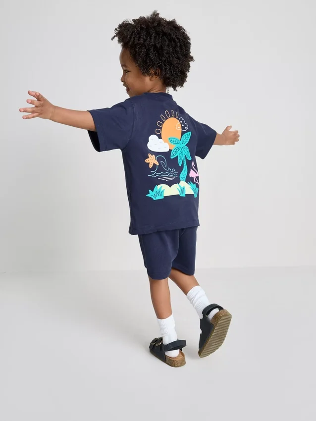 1,5–9 år | T-shirt og shorts-sæt med tropisk grafisk flokket mønster