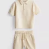 1-9 år | sæt bestående af en struktureret poloshirt og shorts