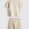 1-9 år | sæt bestående af en struktureret poloshirt og shorts