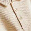 1-9 år | sæt bestående af en struktureret poloshirt og shorts
