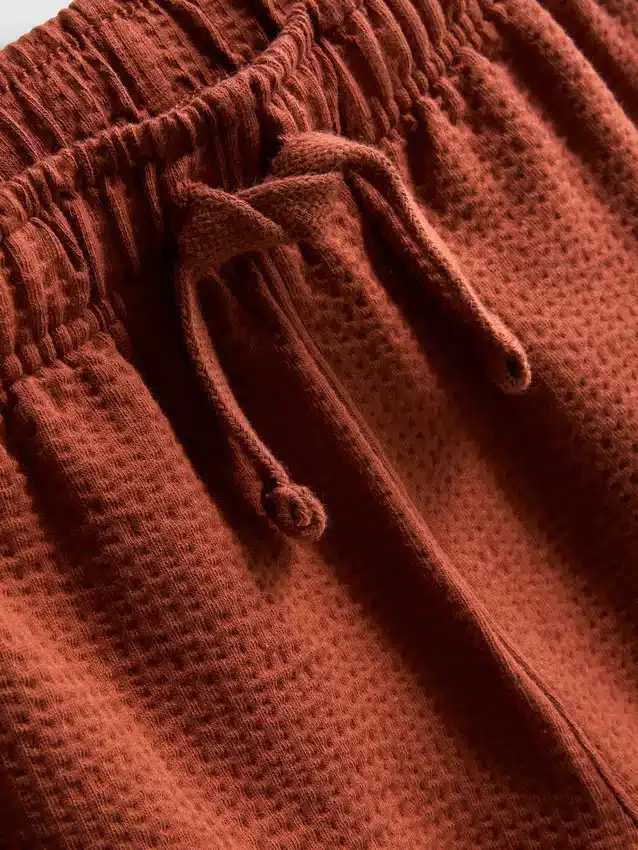 1-9 år | sæt bestående af en struktureret poloshirt og shorts