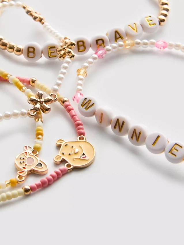 5-pak med Disney Winnie the Pooh-armbånd med perler og figurcharms