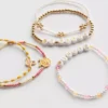 5-pak med Disney Winnie the Pooh-armbånd med perler og figurcharms