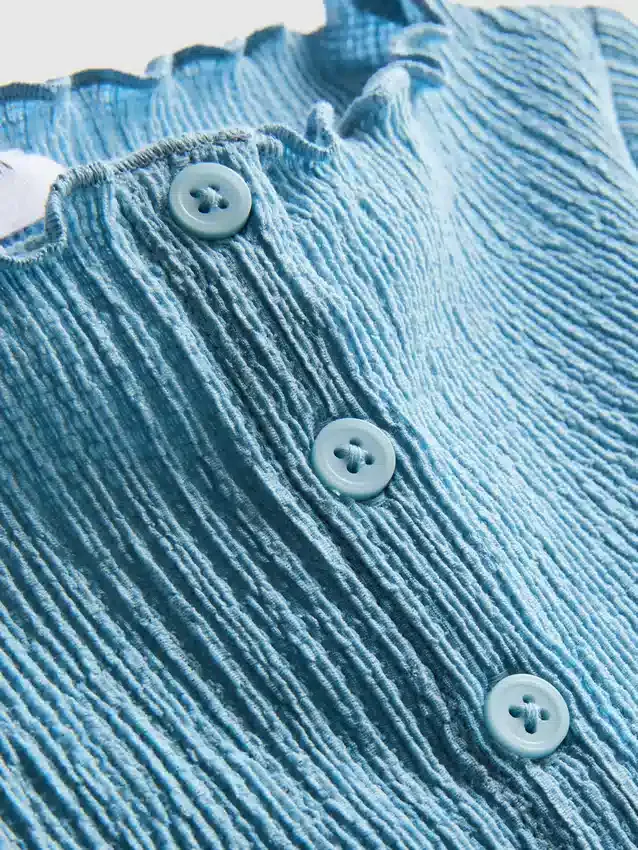 7–15 år | Bluse med krøllet struktur