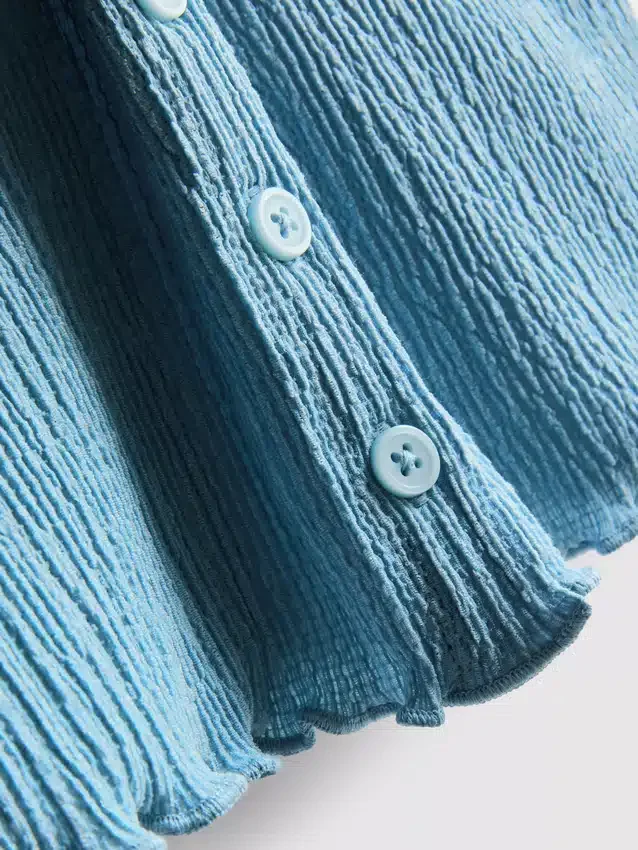 7–15 år | Bluse med krøllet struktur