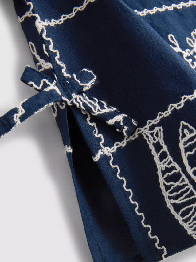 7–15 år | broderet ærmeløs bluse