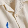7–15 år | broderet skjorte med knapper