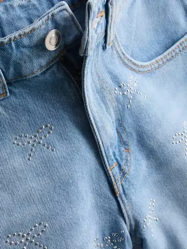 7–15 år | denimshorts med strass-sløjfe
