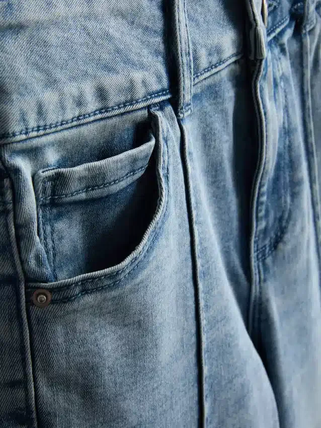 7-15 år | Jeans med pintuck og udvidet ben