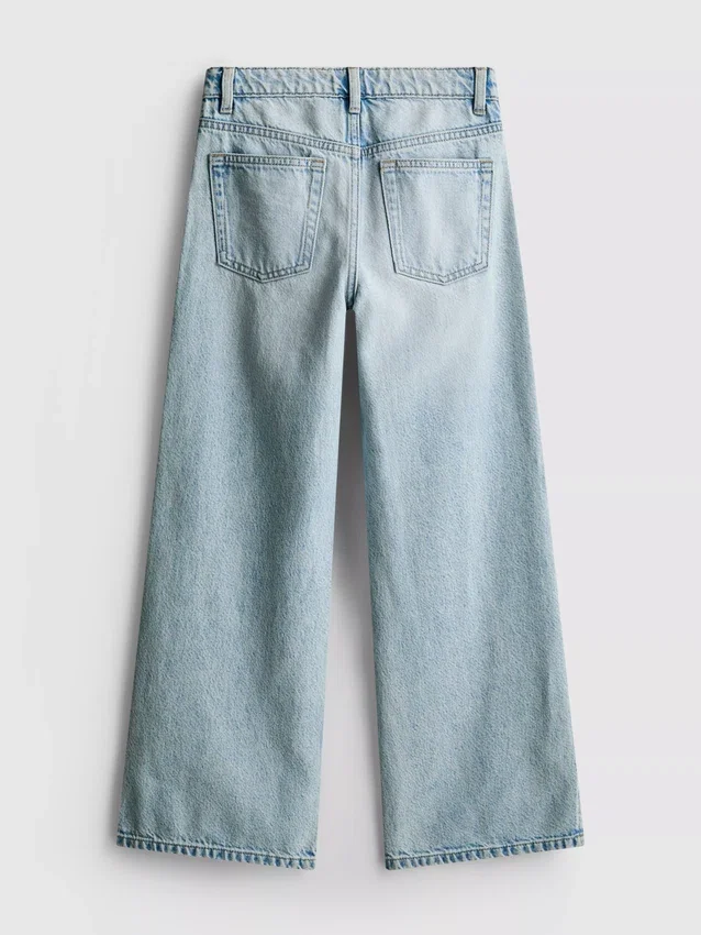 7–15 år | Jeans med slids i sømmen og brede ben