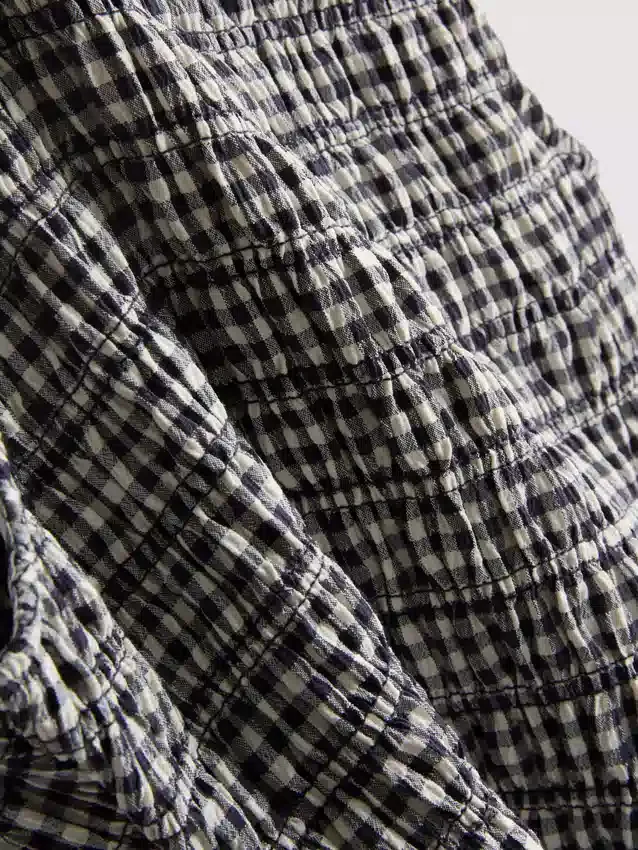 7-15 år | rynket, ærmeløs kjole i gingham