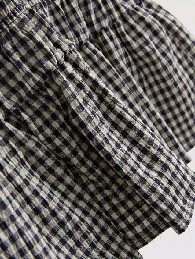 7-15 år | rynket, ærmeløs kjole i gingham