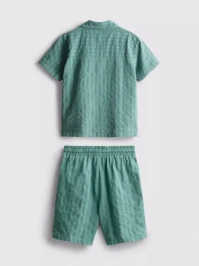 7-15 år | sæt bestående af kortærmet skjorte med knapper og shorts i strukturvævet stof