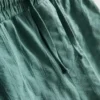 7-15 år | sæt bestående af kortærmet skjorte med knapper og shorts i strukturvævet stof
