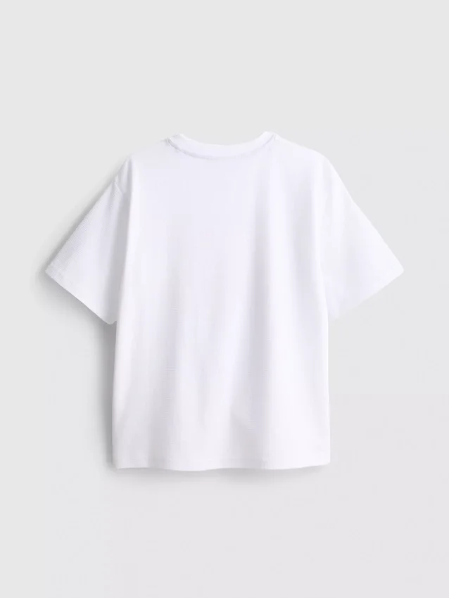 7–15 år | T-shirt med frugtmotiv og struktur