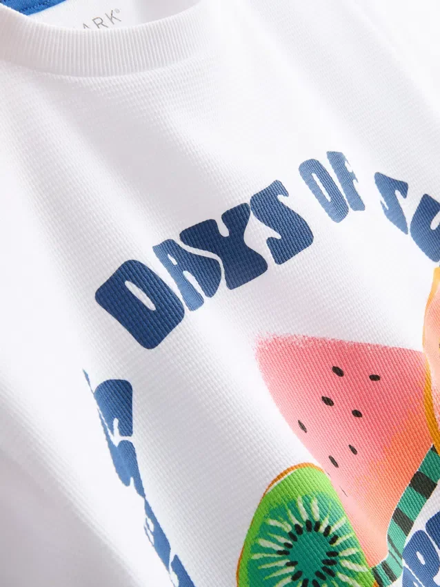 7–15 år | T-shirt med frugtmotiv og struktur