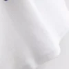 7–15 år | T-shirt med frugtmotiv og struktur