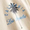7–15 år | T-shirt med palme-print og struktur