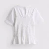 7-15 år | T-shirt med rynket peplum