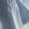 7-15 år | T-shirt med rynket peplum