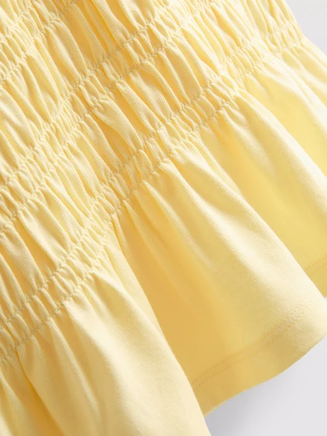 7-15 år | T-shirt med rynket peplum