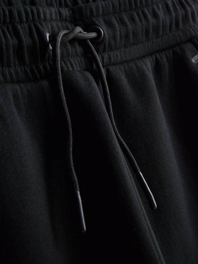 9–15 år | joggingbukser med manchetter