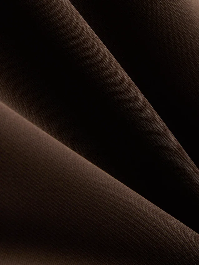 Ærmeløs bodysuit med mesh-indsats