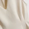 Ærmeløs top med V-udskæring og peplum