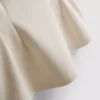 Ærmeløs top med V-udskæring og peplum
