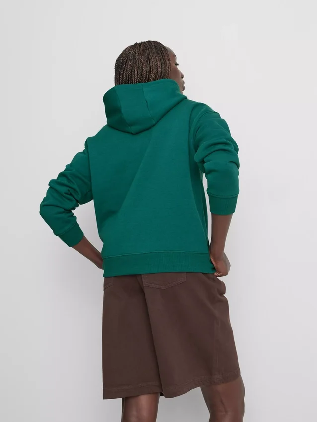 Afslappet hoodie i atletikklub-stil