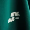 Afslappet hoodie i atletikklub-stil