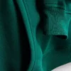 Afslappet hoodie i atletikklub-stil