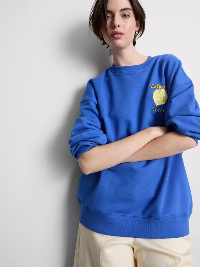 Afslappet sweatshirt i citronfarve med højt bomuldsindhold