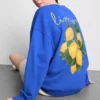 Afslappet sweatshirt i citronfarve med højt bomuldsindhold
