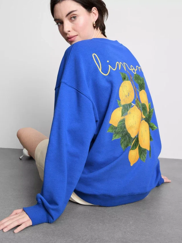 Afslappet sweatshirt i citronfarve med højt bomuldsindhold