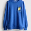 Afslappet sweatshirt i citronfarve med højt bomuldsindhold